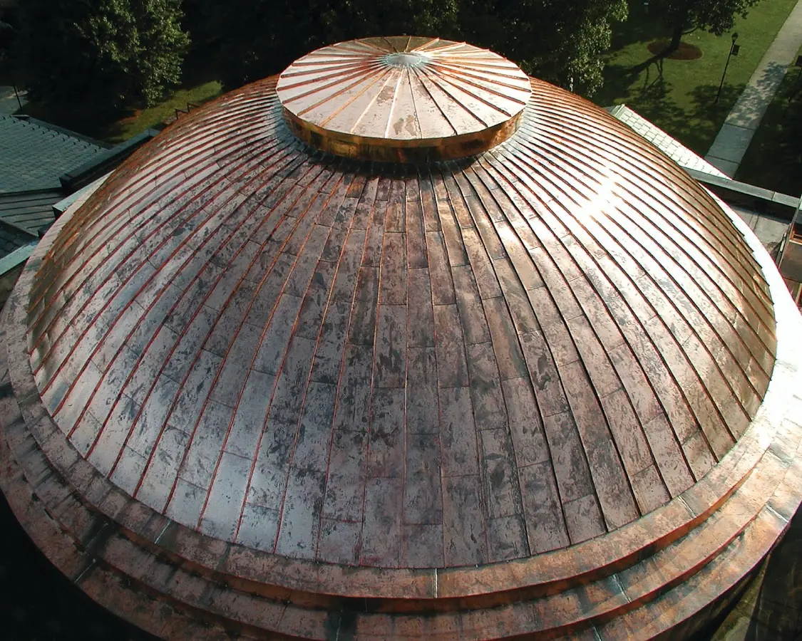 Craftsman Roofing crew installing a new roof in Friendswood